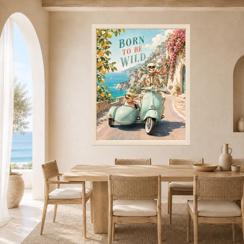 May include: A framed wall art print featuring a skeleton wearing sunglasses and a floral shirt riding a light blue scooter with a sidecar containing a small dog. The text BORN TO BE WILD is printed above, with a coastal background of lemons and flowers.
