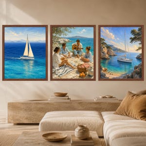 May include: A set of three framed wall art prints featuring coastal scenes. The left print shows a sailboat on blue water, the center depicts three people sitting on a rocky shore with a guitar, and the right shows a sailboat in a cove.