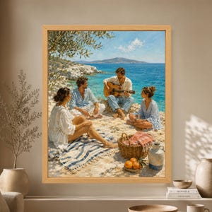 Framed Mediterranean coastal wall art showing four friends relaxing on a rocky seaside shore while one plays acoustic guitar beside a picnic basket, oranges and clear turquoise water.