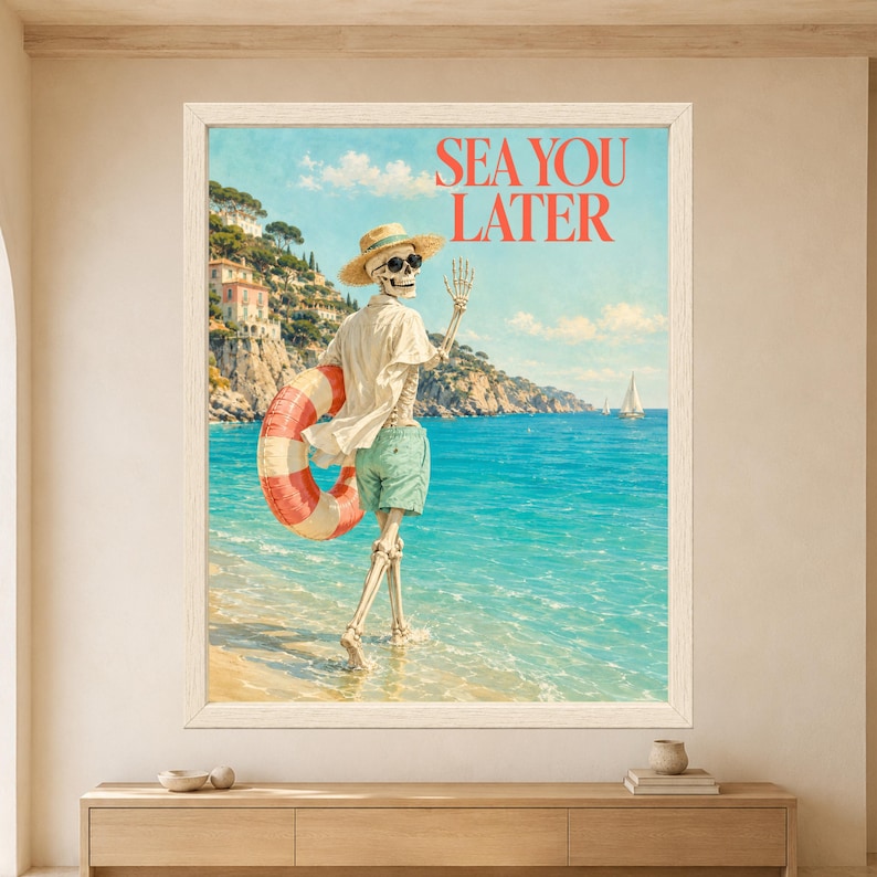 Framed Sea You Later skeleton wall art featuring a sunglasses-wearing skeleton carrying a coral swim ring and waving while walking into a turquoise Mediterranean sea with sailboats and coastal cliffs behind him.