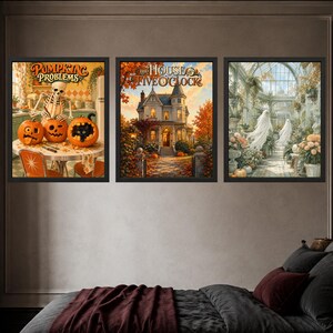 May include: Three framed wall art prints featuring Halloween themes. The first shows a skeleton carving pumpkins with the text 'PUMPKIN PROBLEMS'. The second depicts a Victorian house titled 'THE HOUSE AT FIVE O'CLOCK'. The third shows ghosts in a greenhouse.