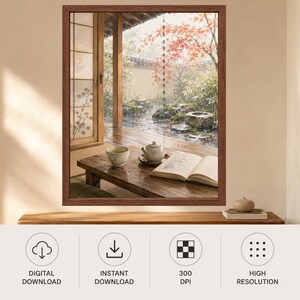 May include: A framed wall art print depicting a rainy Japanese garden scene viewed from a wooden porch. The image features a low wooden table with a ceramic teapot, a teacup, and an open book, set against a backdrop of autumn foliage and stone.