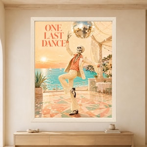Framed One Last Dance skeleton wall art featuring a stylish skeleton dancing beneath a disco ball on a sunny Mediterranean seaside terrace with turquoise water and sailboats.