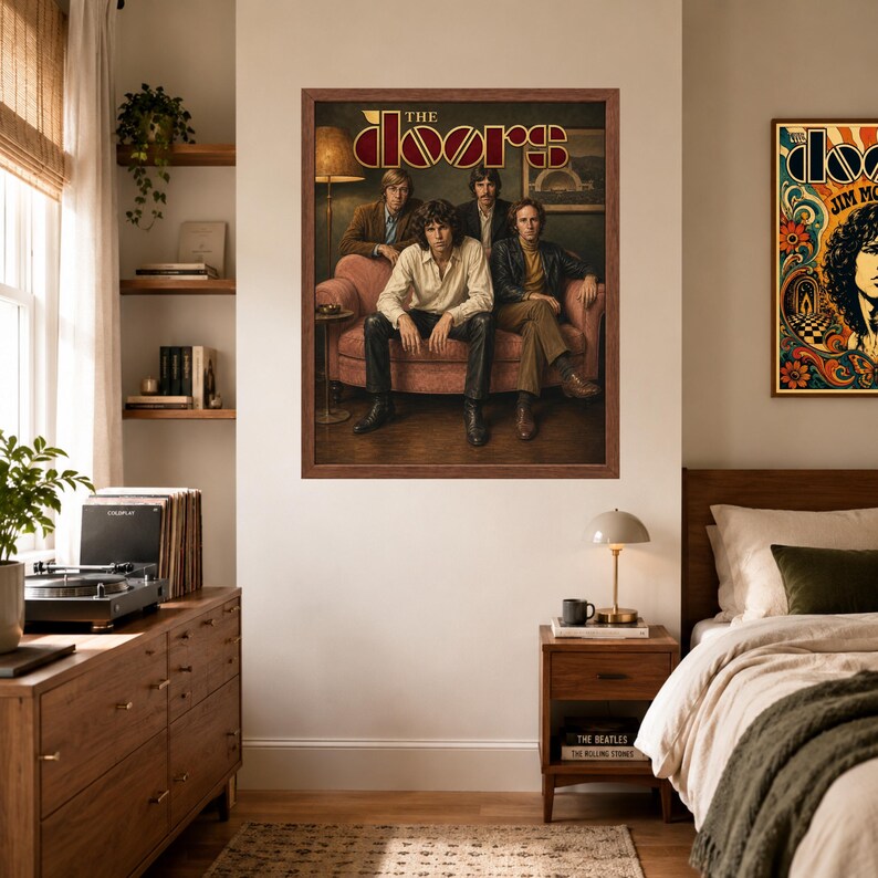 May include: A framed rectangular wall poster featuring a vintage photograph of the band The Doors. The image shows four members sitting on a pink sofa with the text THE DOORS displayed in a stylized font at the top. The frame is dark brown wood.