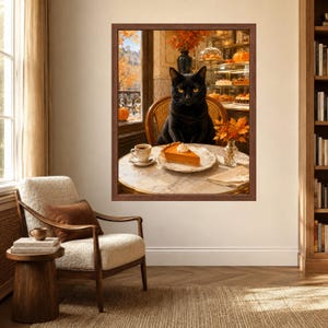 May include: A framed wall art print depicting a black cat sitting at a round marble table in a cafe. On the table sits a slice of pumpkin pie with whipped cream, a cup of coffee, and a small vase of orange autumn leaves. A window shows fall foliage.