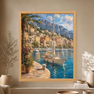 Framed Italian Riviera wall art showing a white sailboat entering a blue Mediterranean marina surrounded by colorful waterfront buildings, palm trees, flowers and rugged coastal mountains.