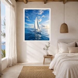 May include: A framed wall art print featuring a white sailboat gliding across deep blue ocean waters under a bright sky with scattered clouds. The scene captures the vessel in motion, creating a gentle wake on the surface of the sea.