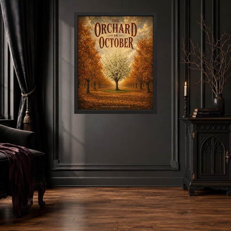 May include: A framed wall art print titled The Orchard in October, featuring a central white tree surrounded by rows of orange and brown autumn trees under a cloudy sky. The text The Orchard in October is printed in a dark brown serif font at the top.
