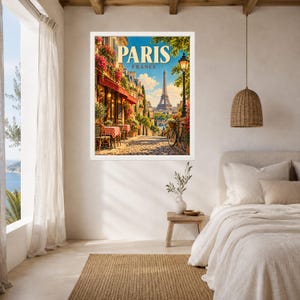 May include: A framed wall art print featuring a vibrant illustration of a Parisian street scene with a sidewalk cafe, red-checkered tables, a bicycle, and the Eiffel Tower in the distance, with the text PARIS FRANCE displayed at the top.