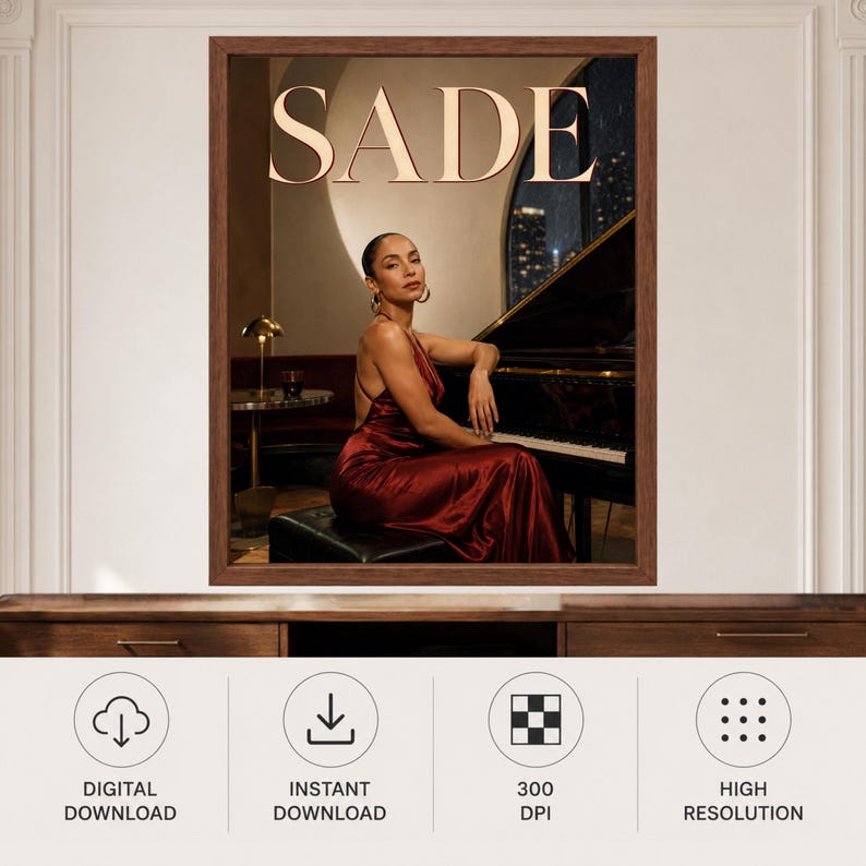 May include: A framed wall art print featuring the text SADE in large serif letters at the top. The image depicts a person in a dark red satin dress sitting at a black grand piano in a dimly lit room with a gold lamp and a city view window.