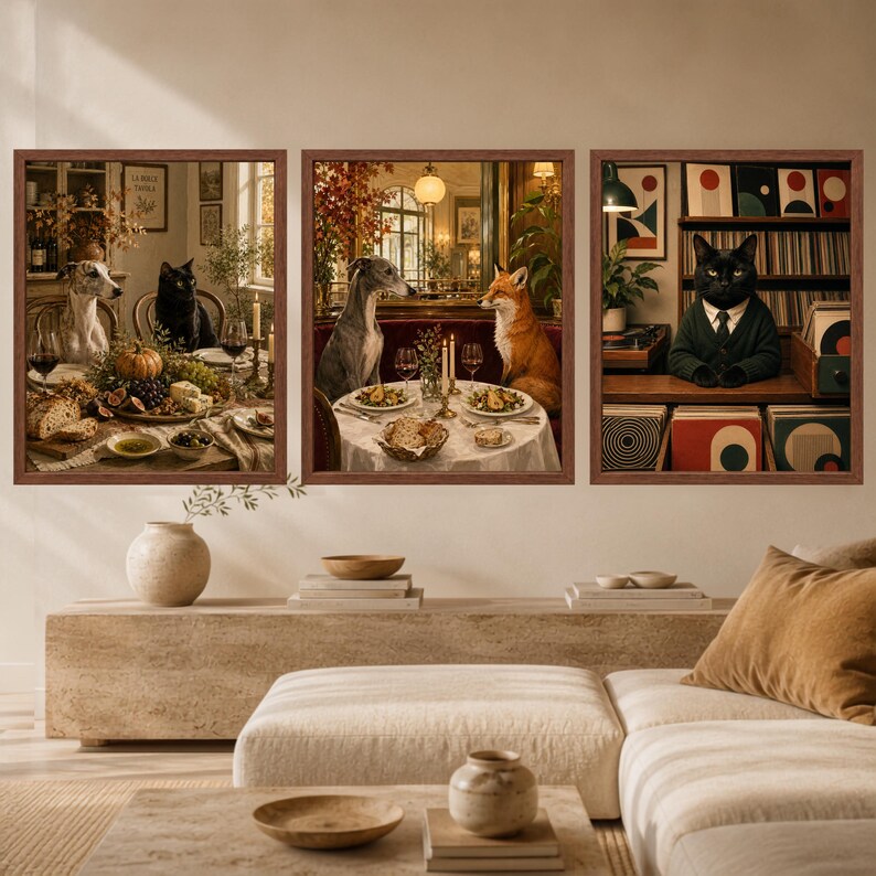 May include: Three framed wall art prints featuring anthropomorphic animals. The first shows a dog and cat at a table, the second a dog and fox dining, and the third a cat in a suit standing before a record collection. Each print has a brown frame.