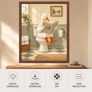 May include: A framed wall art print featuring a white duck with orange feet sitting on a white toilet reading a newspaper. The bathroom scene includes a wicker basket with towels, a potted plant, and a checkered floor, all enclosed in a brown frame.