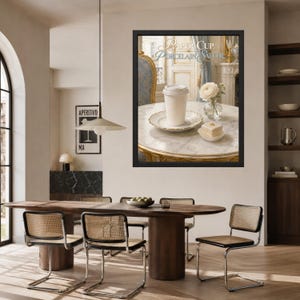 May include: A framed wall art print featuring a white paper cup on a porcelain saucer, a small glass vase with a white flower, and a square pastry on a marble table. The text PAPER CUP PORCELAIN SAUCER is printed in the upper portion of the image.