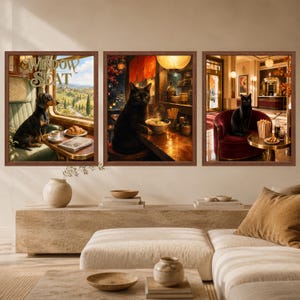 May include: Three framed wall art prints featuring a dachshund on a train with the text Window Seat, a black cat at a ramen bar, and a black cat in a hotel lobby. Each print is enclosed in a brown frame, displaying detailed scenes with warm lighting and rich colors.