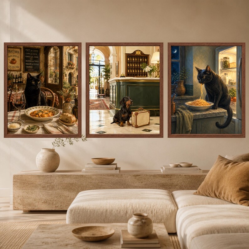 May include: Three framed wall art prints featuring a black cat sitting at a restaurant table with food, a dachshund sitting in a hotel lobby next to a suitcase, and a black cat eating spaghetti from a bowl on a kitchen counter at night.