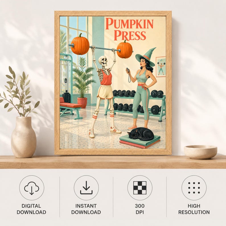 May include: A framed wall art print titled Pumpkin Press featuring a skeleton lifting a barbell with two orange pumpkins as weights. A person in a green witch hat and athletic wear stands nearby with a black cat resting on a mat in the foreground.