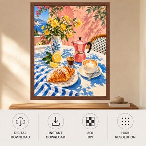 May include: A framed wall art print depicting a breakfast scene on a table with a blue and white striped tablecloth. The scene features a croissant on a plate, a cup of latte, a pink moka pot, a vase of yellow flowers, and lemon slices.