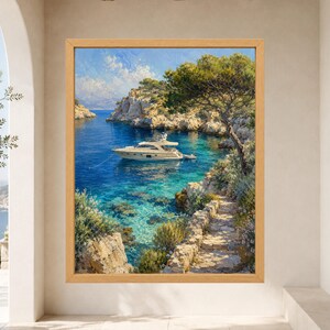May include: A framed landscape painting depicting a white motor yacht anchored in a turquoise Mediterranean cove. The scene features rugged limestone cliffs, a stone pathway along the shore, and a large pine tree under a bright blue sky.