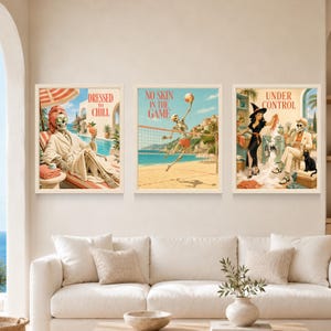 May include: Three framed wall art prints featuring skeleton figures. The first shows a skeleton in a robe with the text DRESSED TO CHILL. The second depicts a skeleton playing volleyball with the text NO SKIN IN THE GAME. The third shows a skeleton and a person with the text UNDER CONTROL.