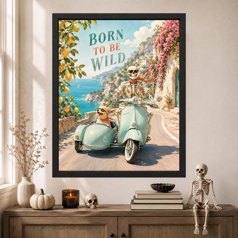 May include: A framed wall art print featuring a skeleton wearing sunglasses and a floral shirt riding a light blue scooter with a sidecar. A small dog with sunglasses sits in the sidecar. The text BORN TO BE WILD is centered above a coastal scene.