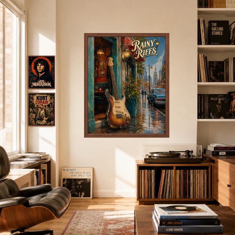 Puede incluir: Una impresi&oacute;n art&iacute;stica enmarcada titulada Rainy Riffs que muestra una guitarra el&eacute;ctrica apoyada contra la entrada de un edificio en una calle urbana mojada con un coche y un horizonte lejano. La obra usa tonos c&aacute;lidos e incluye el texto Rainy Riffs.