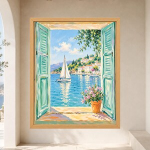 May include: A framed painting depicting an open window with light blue shutters looking out onto a coastal scene. A white sailboat floats on blue water near a hillside town with white buildings. A terracotta pot with pink flowers sits on the sill.