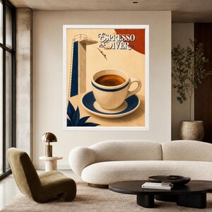 May include: A framed wall art print titled Espresso Diver featuring a cream-colored coffee cup and saucer with blue trim. The illustration includes a high diving board, a diver mid-air, and a large red circle against a beige background.