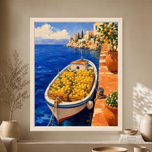 Framed Mediterranean lemon wall art showing a traditional wooden boat loaded with crates of yellow lemons beside a terracotta coastal quay, deep blue sea and sunlit Italian cliffside village.