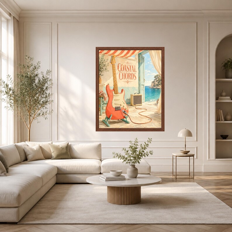 May include: A framed wall art print titled Coastal Chords featuring a coral-coloured electric guitar on a stand, connected by a cable to a small amplifier, set against a Mediterranean-style patio overlooking a bright blue sea and sky.