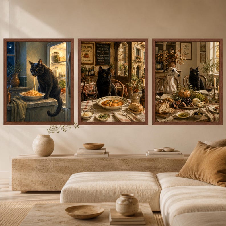 May include: A set of three framed wall art prints featuring black cats in various dining scenes. The first shows a cat eating spaghetti by an open refrigerator, the second a cat at a table with pasta, and the third a cat and dog at a feast.