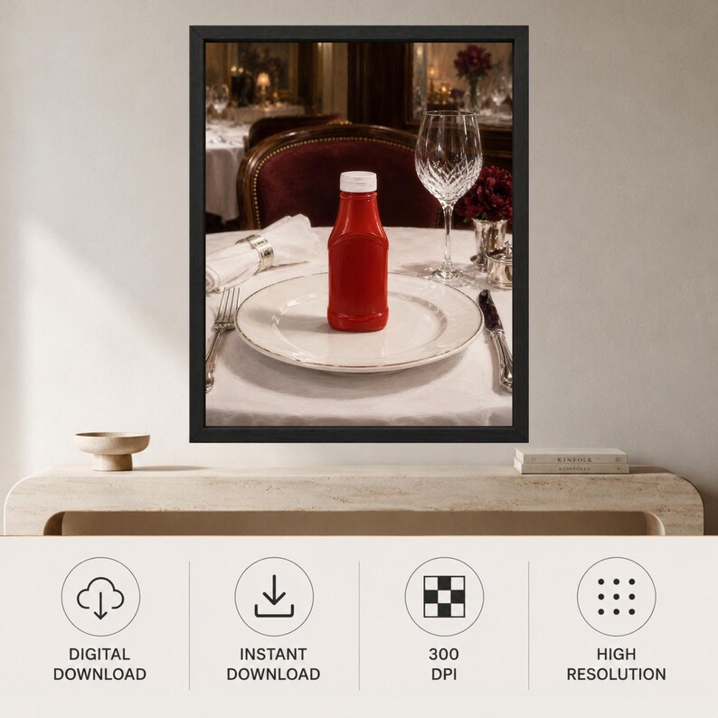 May include: A framed wall art print featuring a red ketchup bottle centered on a white dinner plate. The table setting includes a white napkin, a silver fork, a silver knife, and a clear crystal wine glass, all arranged on a white tablecloth.