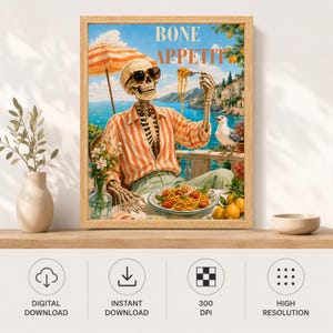 Peut inclure: Une impression d'art encadr&eacute;e intitul&eacute;e BONE APPETIT repr&eacute;sentant un squelette portant des lunettes de soleil et une chemise ray&eacute;e orange, mangeant des spaghettis au bord de la mer. La sc&egrave;ne inclut un parasol, une mouette et des citrons.