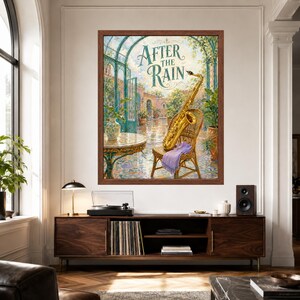 May include: A framed wall art print titled After The Rain, featuring a golden saxophone resting on a wicker chair in a sunlit courtyard. The scene includes a round table, lush green plants, and a purple cloth draped over the chair seat.