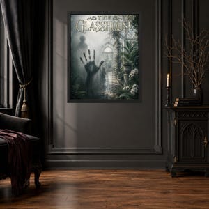May include: A framed wall art print titled THE GLASSHOUSE featuring a dark, misty greenhouse scene with a prominent handprint on the glass, surrounded by lush green foliage, white flowers, and a shadowy figure in a moody, atmospheric setting.