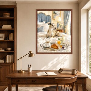 May include: A framed wall art print depicting a brindle greyhound resting on a white bed with a silver tray holding a croissant, a cup of coffee, and a glass of orange juice. The scene includes a blue headboard, a lamp, and curtains.