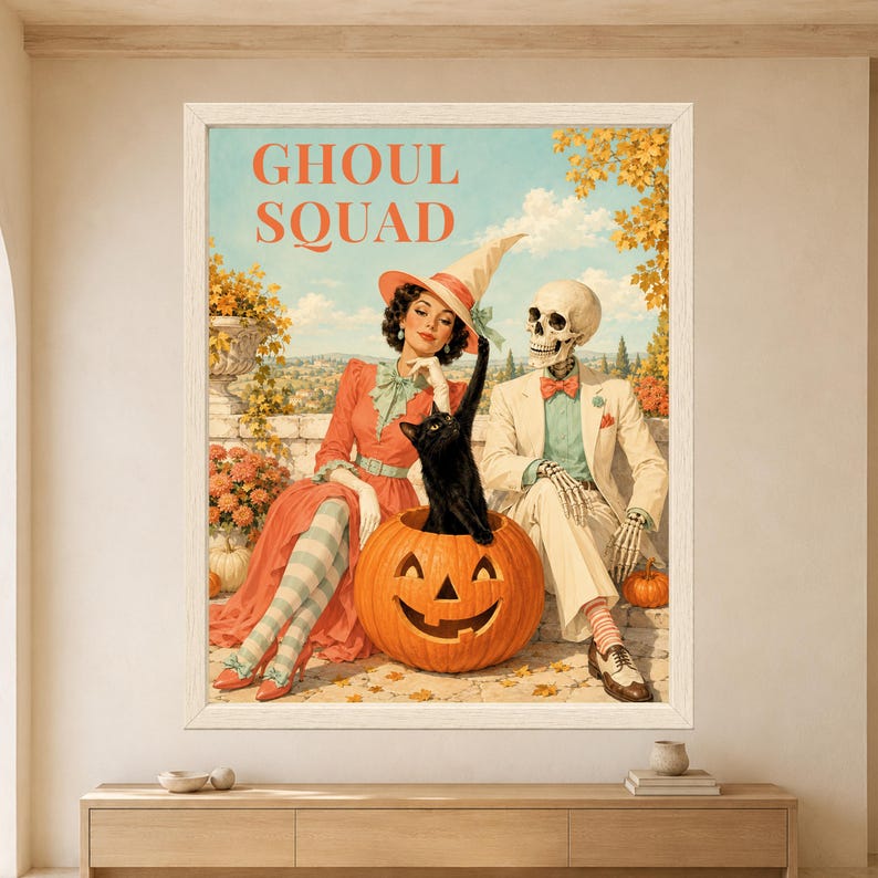 Framed Ghoul Squad Halloween wall art featuring a stylish witch and skeleton sitting beside a black cat inside a jack-o’-lantern, surrounded by pumpkins, autumn flowers and colorful retro decor.