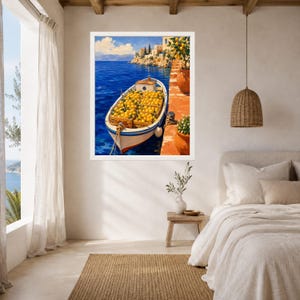 May include: A framed wall art print depicting a white boat filled with wooden crates of bright yellow lemons, docked along a terracotta-colored stone pier next to a deep blue sea, with a coastal village visible in the distant background.
