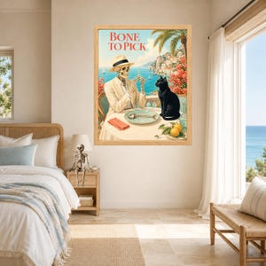 Peut inclure: Une impression d'art encadr&eacute;e intitul&eacute;e BONE TO PICK repr&eacute;sentant un squelette en costume beige et chapeau fedora assis &agrave; une table avec un chat noir. La sc&egrave;ne montre un paysage c&ocirc;tier avec une ar&ecirc;te de poisson, une serviette rouge et deux citrons.