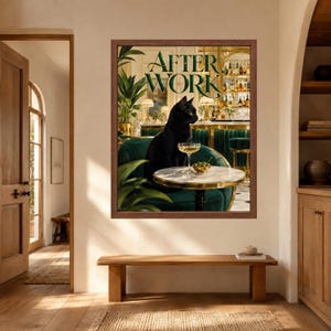 May include: A framed wall art print titled AFTER WORK featuring a black cat sitting on a dark green velvet chair at a small round marble table with a cocktail glass and a bowl of olives, set against a blurred bar background with gold accents.