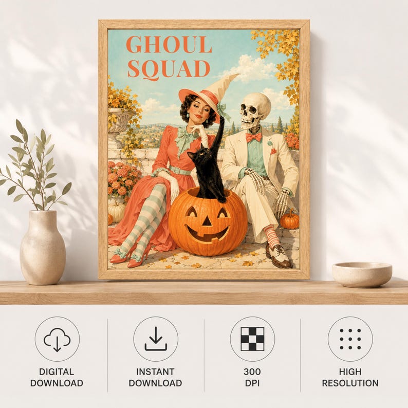May include: A framed wall art print titled GHOUL SQUAD featuring a woman in a red dress and witch hat sitting next to a skeleton in a beige suit. A black cat emerges from a large orange jack-o'-lantern between them in a garden setting.