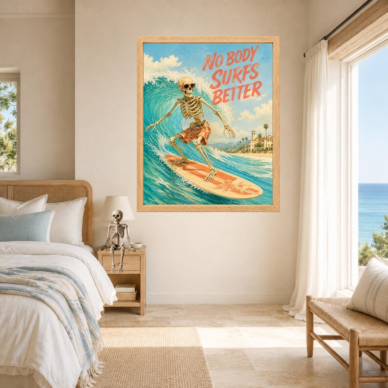 May include: A framed wall art print featuring a skeleton wearing sunglasses and patterned shorts while surfing on a large blue wave. The text NO BODY SURFS BETTER is printed in red at the top. The background shows a coastal scene with buildings.