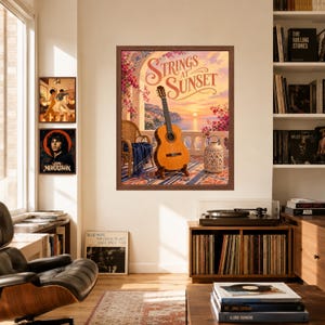 May include: A framed wall art print titled Strings at Sunset featuring an acoustic guitar on a stand, a wicker chair with a blue throw, and a decorative lantern on a balcony overlooking a sunset ocean view with pink flowers.