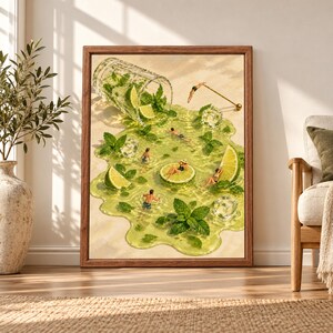Framed surreal mojito wall art showing tiny swimmers in a spilled lime and mint cocktail surrounded by ice cubes, citrus wedges and fresh green leaves.