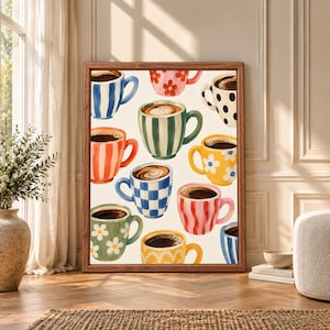 Framed colorful coffee cup wall art featuring patterned mugs in blue, green, pink, orange and yellow with stripes, checks, flowers and polka dots on a warm cream background.