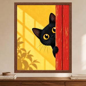 May include: A framed wall art print featuring a black cat with large yellow eyes peeking from behind a textured red wooden door. The background is a bright yellow wall with a shadow of a plant cast by sunlight coming through a window pane.