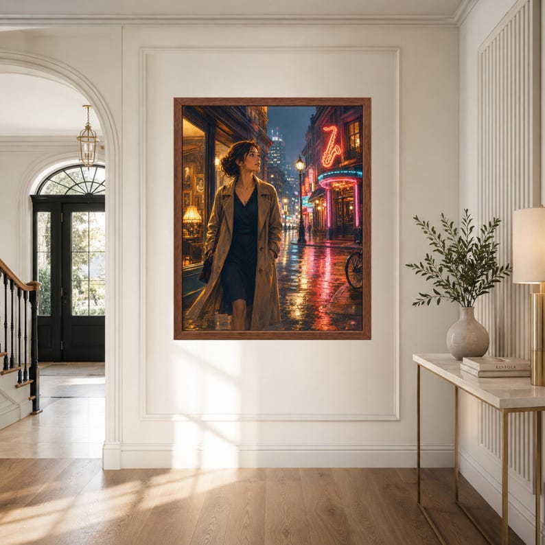 May include: A framed wall art print depicting a person in a tan trench coat and dark dress walking down a rain-slicked city street at night. The scene features glowing neon signs, including a red saxophone, and reflections on the wet pavement.