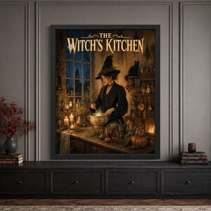 Framed witch Halloween wall art featuring a woman in a black witch hat preparing a glowing potion in a rustic candlelit kitchen, with a black cat, herbs, potion bottles, pumpkins and “The Witch’s Kitchen” typography.