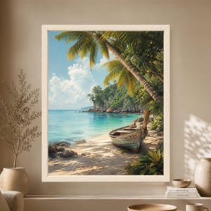 Framed tropical beach wall art showing a weathered wooden boat beneath palm trees on a sandy shore beside clear turquoise water, tropical greenery and a rocky island cove.