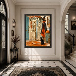 May include: A framed wall art print titled LAST MINUTE COSTUME featuring a skeleton standing before a mirror, a black cat sitting on an orange rug, a witch hat, a black and orange cape, and a pumpkin on a blue cabinet in a room setting.