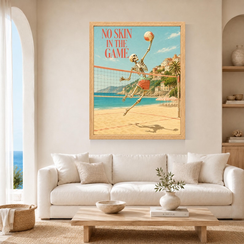 May include: A framed wall art print featuring a skeleton playing beach volleyball with the text NO SKIN IN THE GAME. The scene depicts a skeleton jumping to hit a volleyball over a net on a sandy beach with a coastal town in the background.